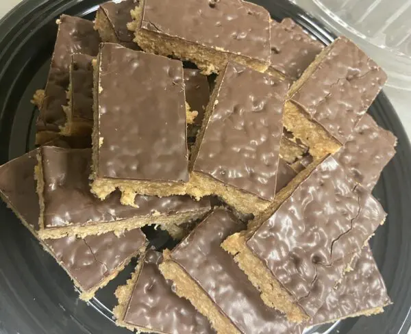 A plate of chocolate covered graham crackers.