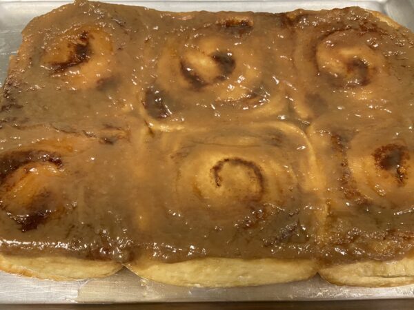 A close up of a pastry covered in caramel
