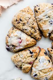 A close up of some scones with icing on them
