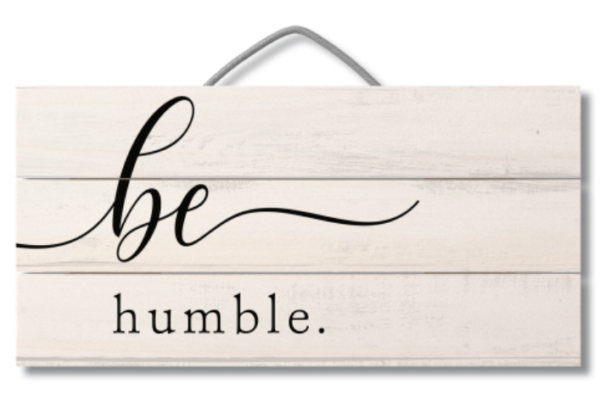 A sign that says be humble.