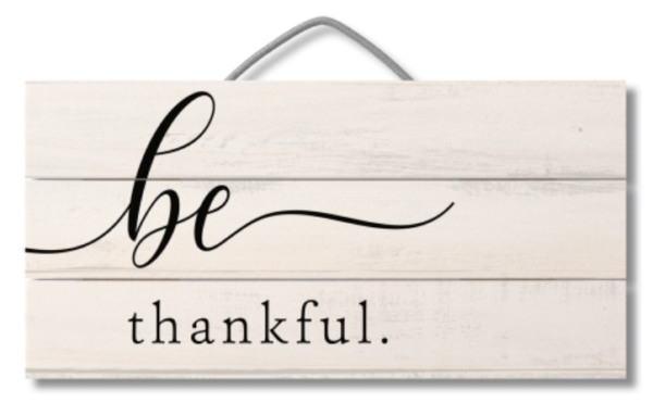 A sign that says be thankful.