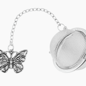 A tea infuser with a butterfly charm attached to it.