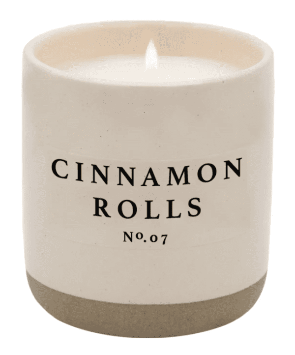 A candle that is sitting in the middle of a table.