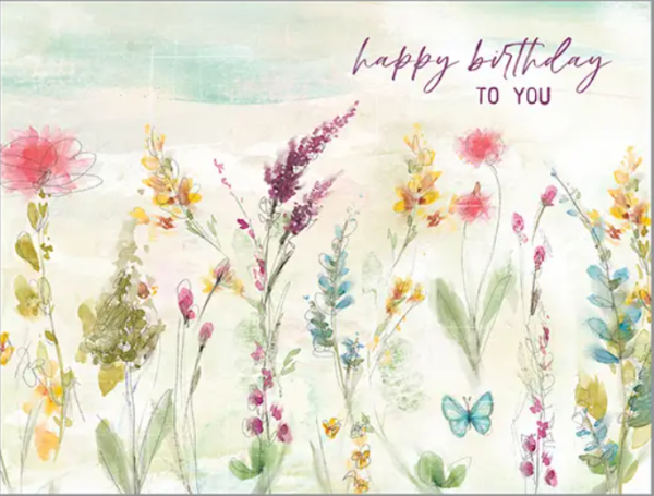 A birthday card with flowers and butterflies