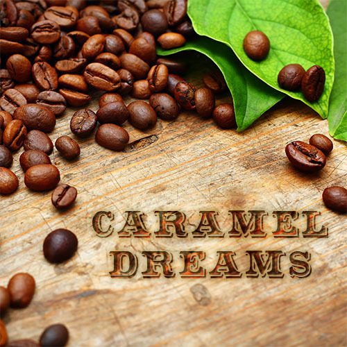 A wooden table topped with coffee beans and leaves.