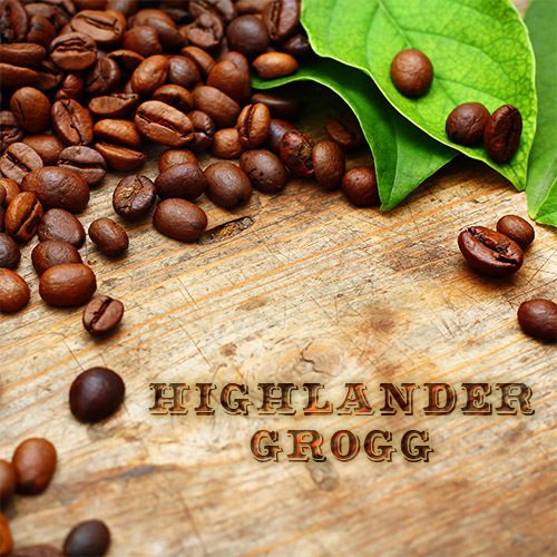 A wooden table topped with coffee beans and leaves.