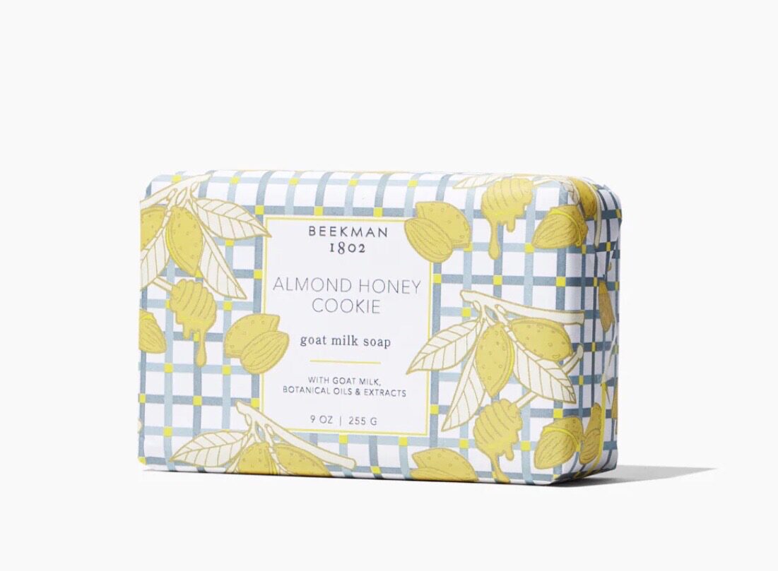 A bar of soap with lemons and honey on it.