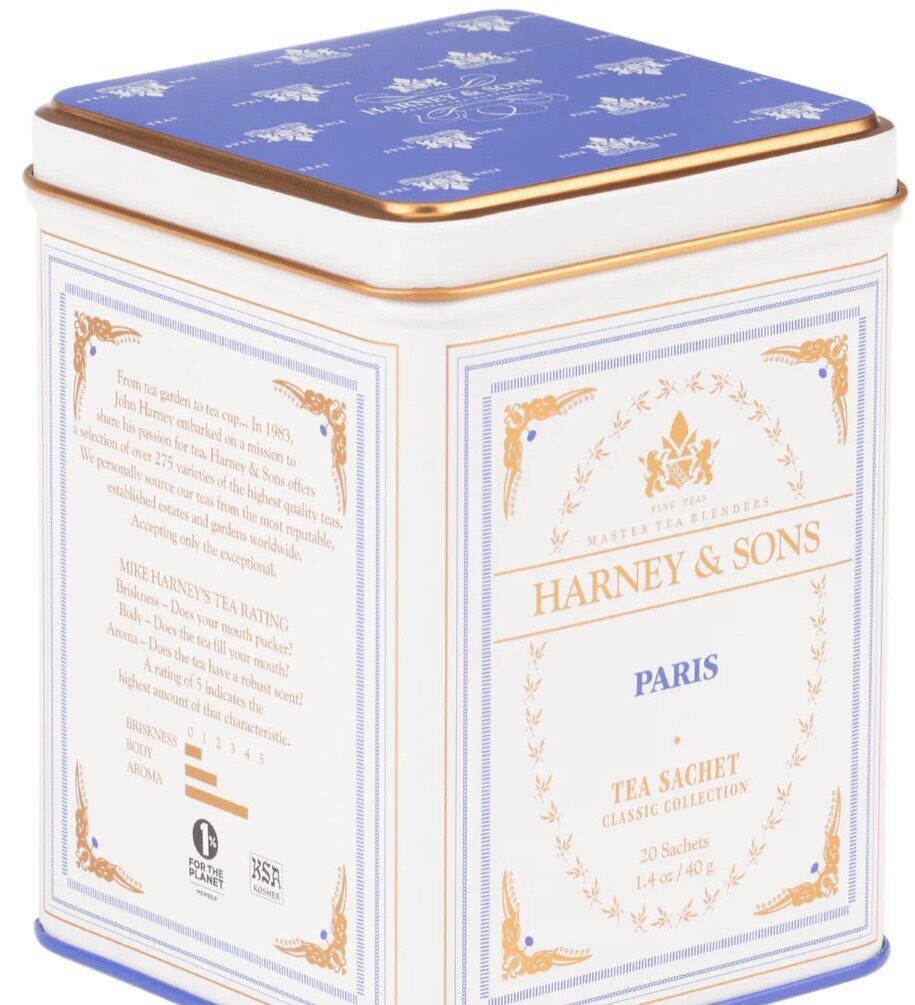 A blue and white tin with the words harney & sons paris on it.