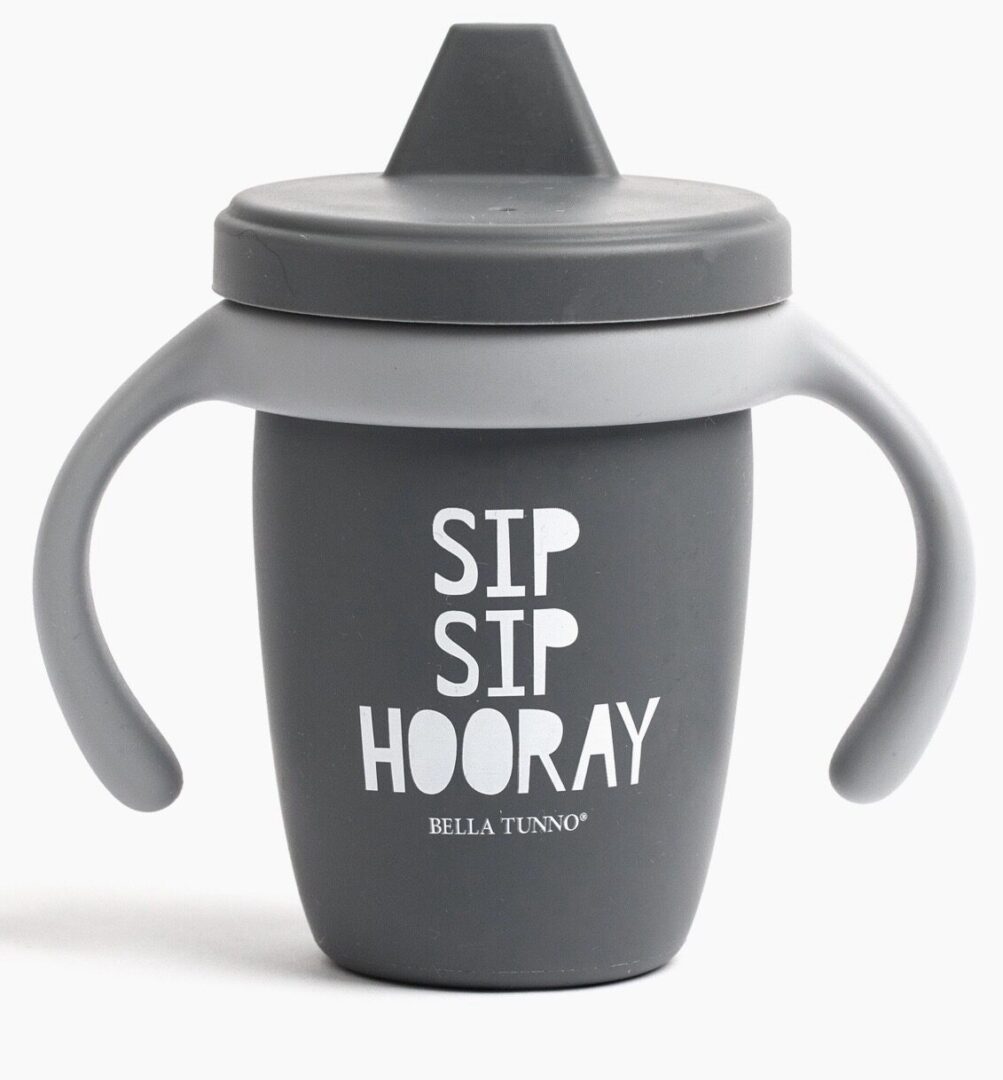 A cup with the words " sip, sip hooray ".