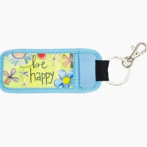 A key chain with a picture of flowers and the words " be happy ".