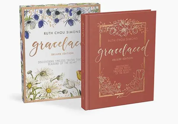 Two books, one of which is a floral design and the other of a red book.