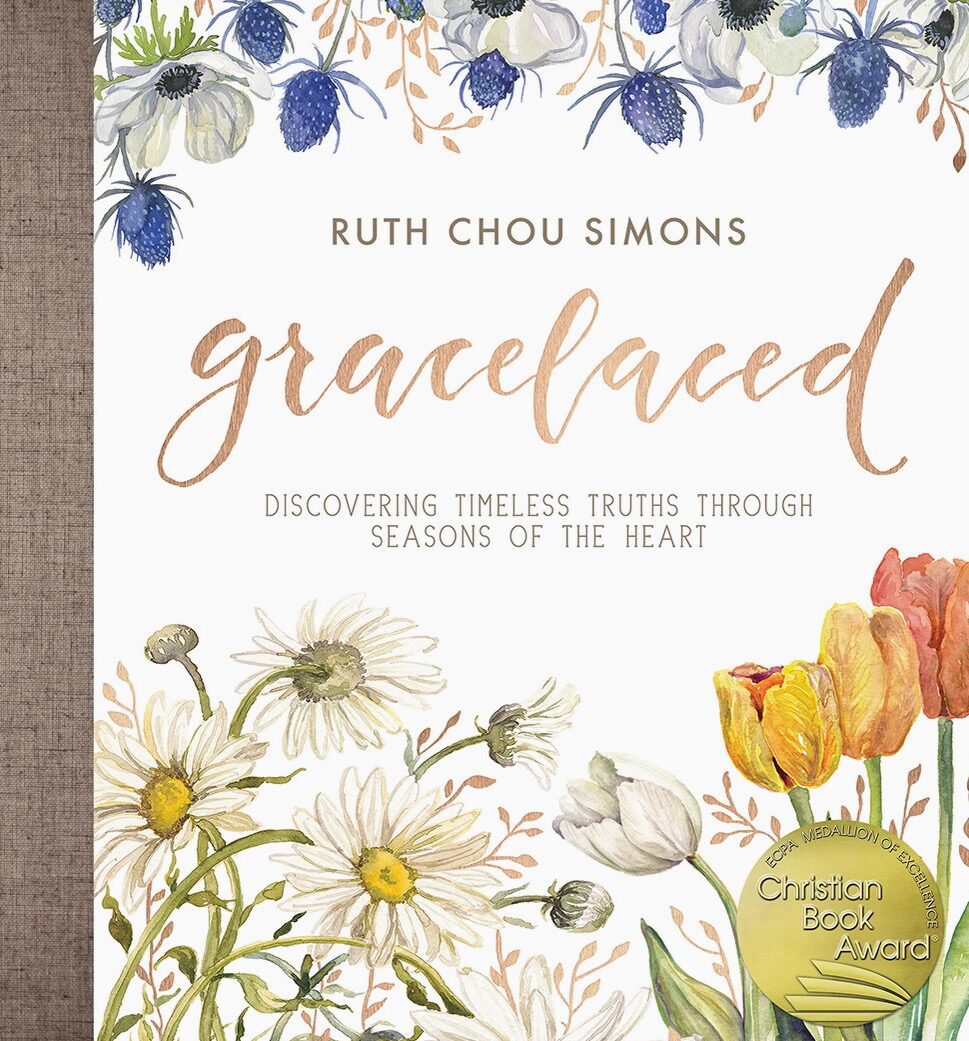 A book cover with flowers and a blue background