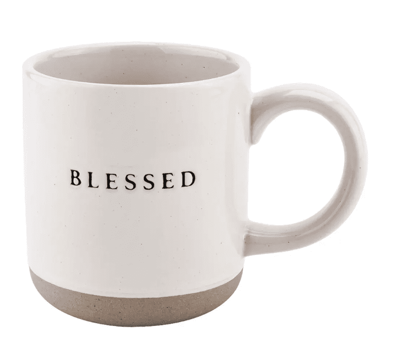 White ceramic mug with the word "BLESSED" printed in black.