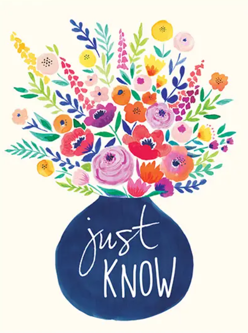 Colorful flowers in a vase with the words "just know" written on it.