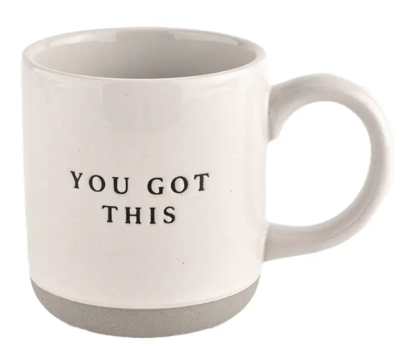 White mug with a smooth handle, displaying the motivational phrase "YOU GOT THIS" in black capital letters on one side.