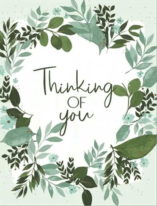 Greeting card with the message "Thinking of You" surrounded by a decorative border of green leaves and small flowers.