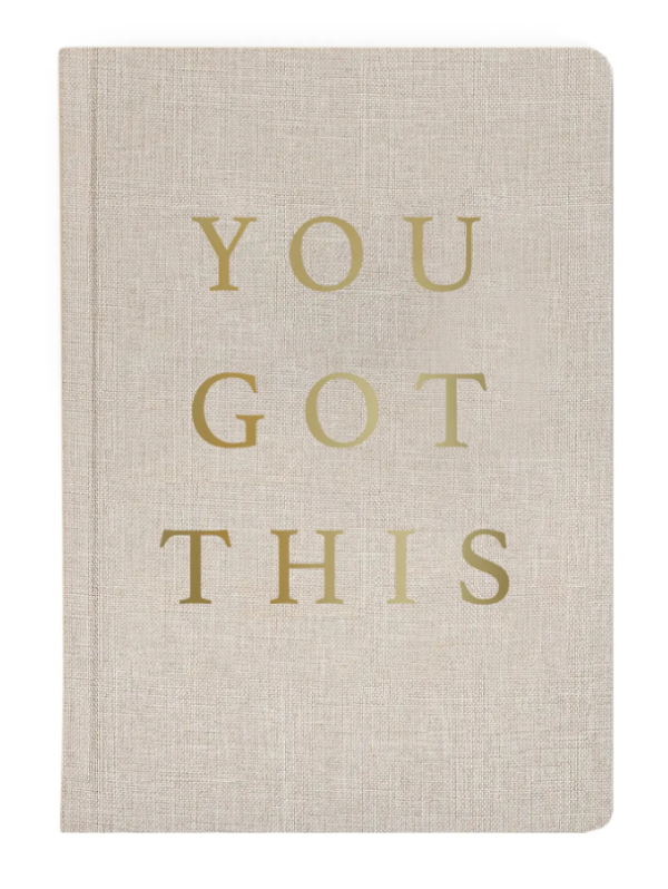 Beige notebook with the phrase "YOU GOT THIS" in gold letters on the cover.