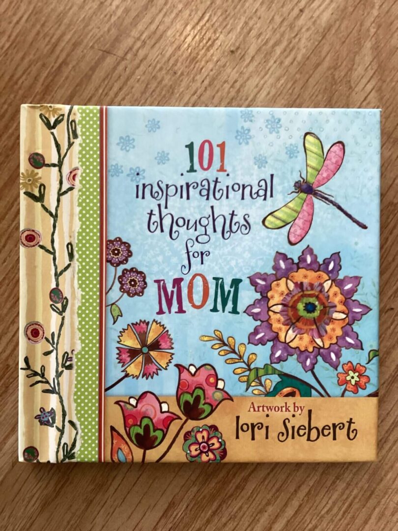 Cover of a book titled "101 Inspirational Thoughts for Mom" with colorful floral and dragonfly artwork by Lori Siebert.