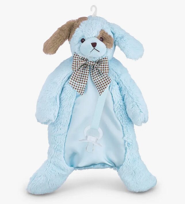 A light blue plush dog with a brown ear and eye patch, featuring a checkered bow tie and a hanging loop on top.