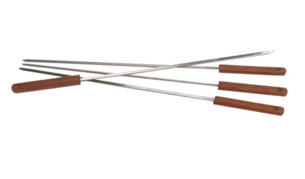A set of three skewers from the Skewer Set, featuring wooden handles, are arranged in a crisscross pattern against a simple white background.