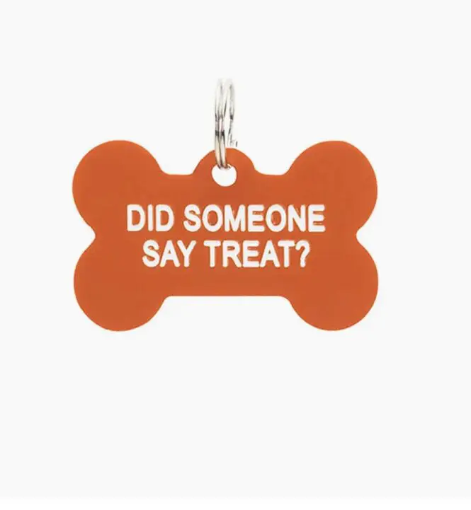 Orange bone-shaped tag with the text "Did someone say treat?" printed in white.
