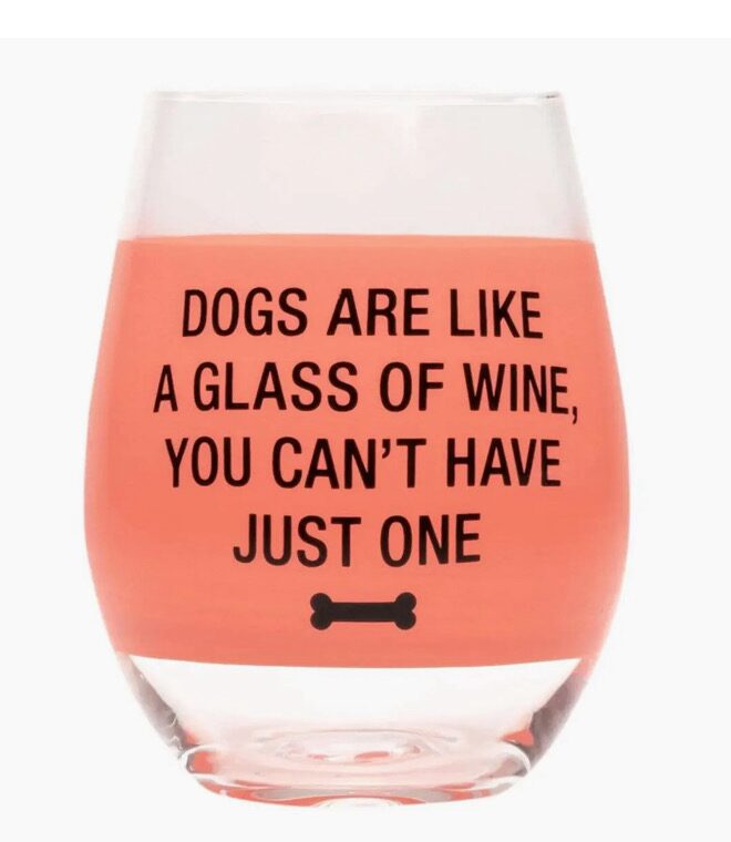 A wine glass filled with pink liquid has the text: "Dogs are like a glass of wine, you can't have just one," with a small bone icon below.