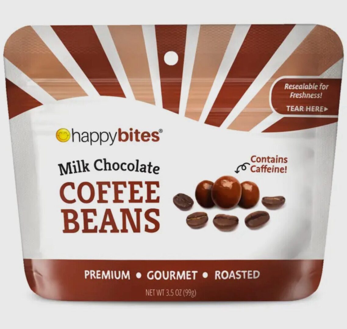 A pouch of milk chocolate coffee beans labeled "happibites." The package is beige and brown with text indicating it is premium, gourmet, roasted, and contains caffeine.