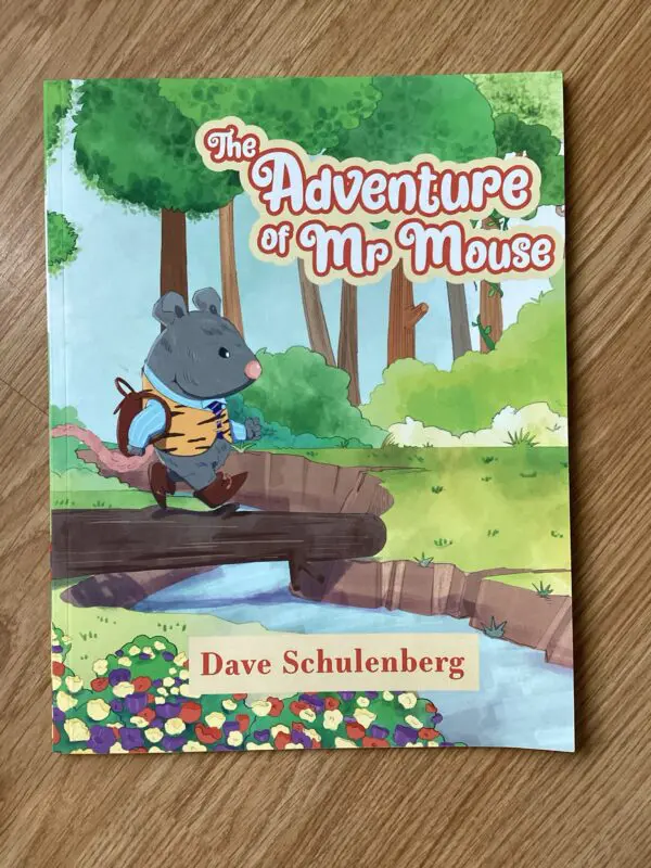 Children's book titled "Adventures of Mr. Mouse" by Dave Schulenberg, featuring an illustration of a mouse walking on a bridge in a forest.
