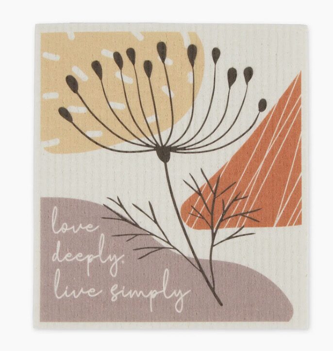 Featuring an abstract floral design with geometric shapes, the Love Deeply Live Simply Swedish Dishcloth includes the phrase "love deeply, live simply.